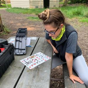 woman attempts to solve puzzle