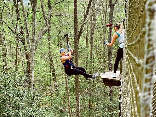 Friends laughing at Go Ape zipline Raleigh