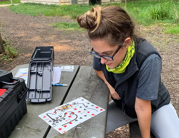 Woman attempts a puzzle